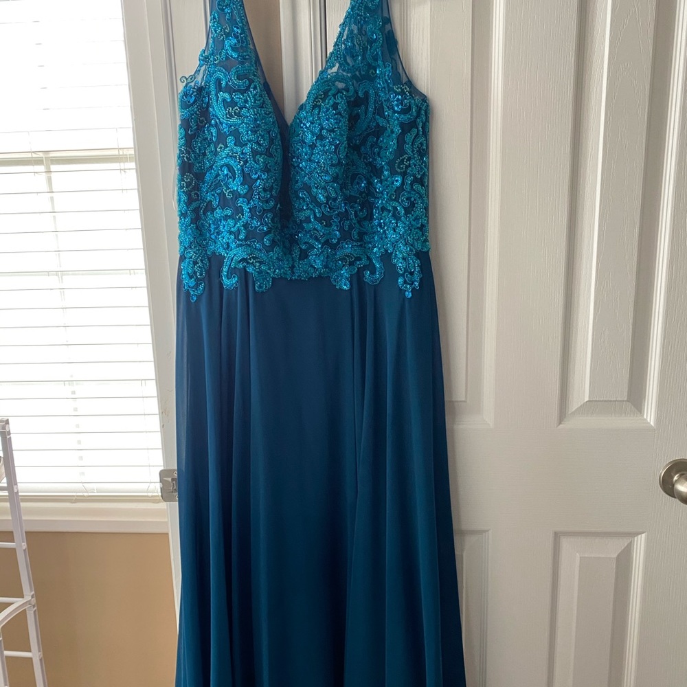 does have a unnoticeable stain that could probably come off at the dry cleaners.